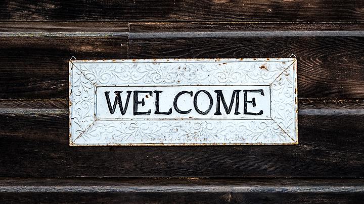 Logo for Welcome Center Team