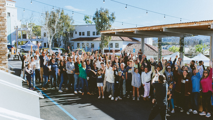 Logo for Impact Volunteers