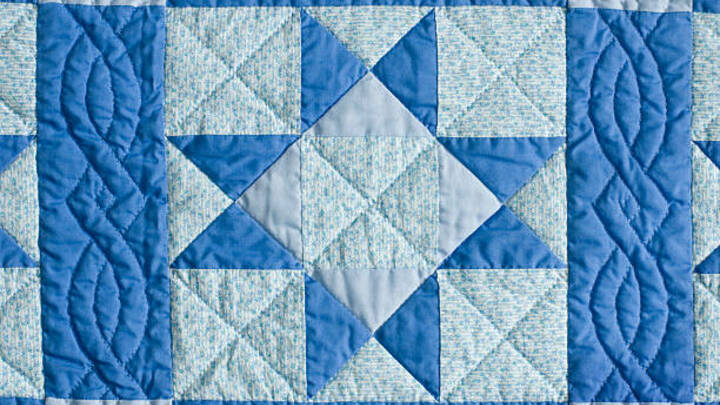 Logo for Quilting Ministry