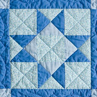 Logo for Quilting Ministry