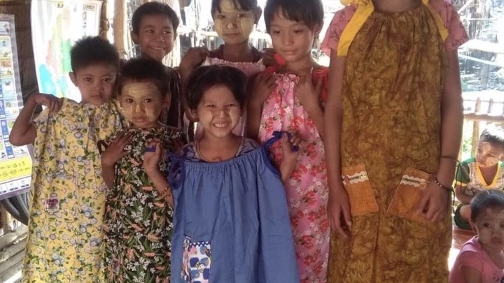 Logo for Sewing Group (Dress a Girl Around the World)