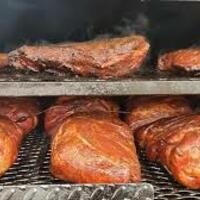 Logo for Holy Smoke BBQ