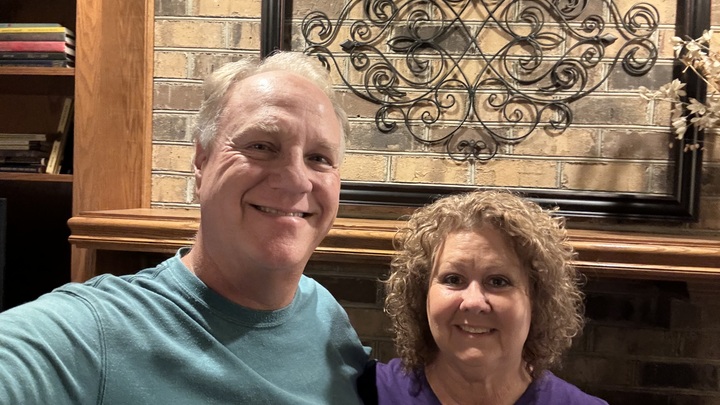 Logo for Travis and Sandy Hudson