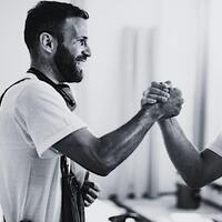 Logo for Helping Hands Master Group