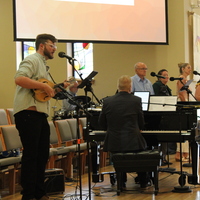 Logo for Praise Band