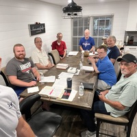 Logo for Tuesday Night Men