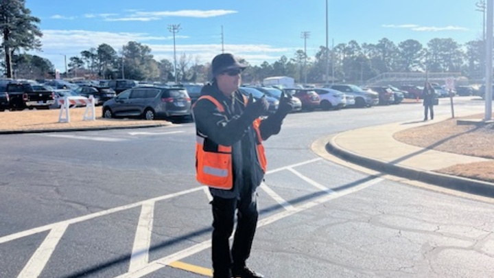 Logo for McPherson Parking Team