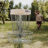 Logo for Disc Golf Community Group