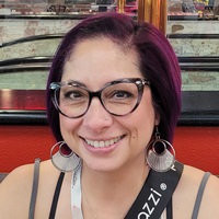 Logo for Andrea Prado | Tuesday | 10AM