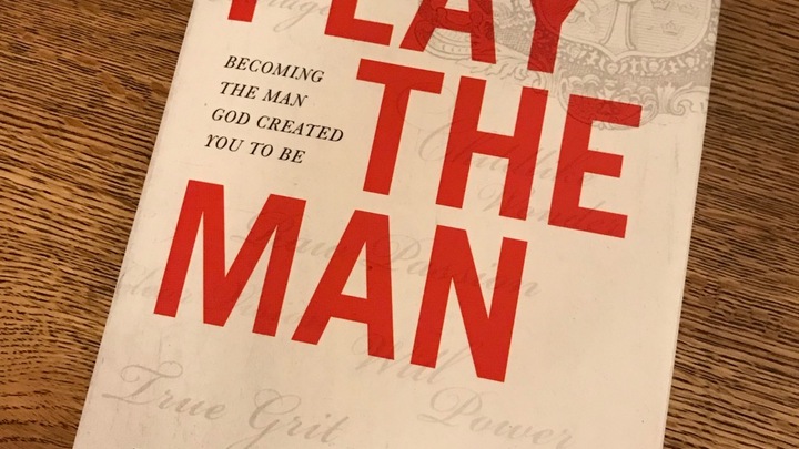 Logo for Play The Man