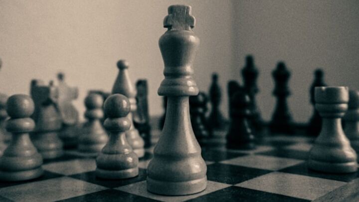 Logo for The King's Gambit (Men's Chess)