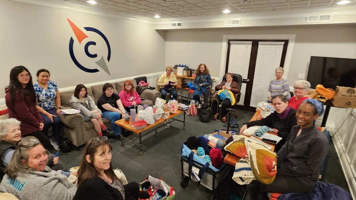 Logo for Prayer Shawl Outreach- Women's Crochet & Knitting Group -