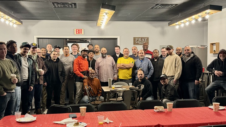 Logo for Wolcott Men Of Valor