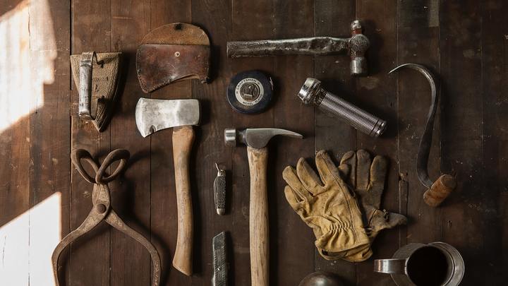 Logo for Helping Hands - Outreach