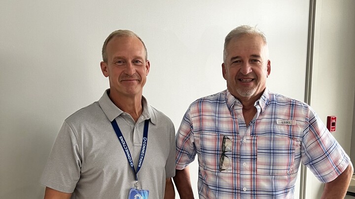 Logo for Man Group w/Marty and Steve